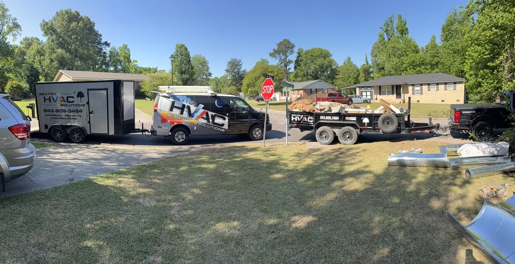 Sexton HVAC Solutions branded work van and service trailer in the Lowcountry